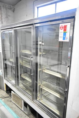 Zero Zone TA30AWCF 3 Door Metal Reach-In Cooler with poly-coated racks, 115V, 1 Phase, commercial use, excellent condition.