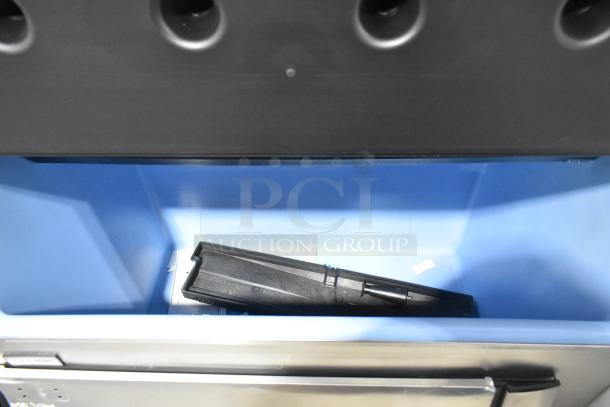 2023 Ice-O-Matic CIM1446HR6 stainless steel commercial ice head on bin, 208-230V, 1 phase, sleek design, appears unused.