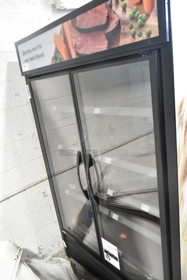 2021 True TVM-48SL-HC 2-Door Commercial Cooler with metal shelves, glass doors, 115V, 1 phase. Clean, good condition.