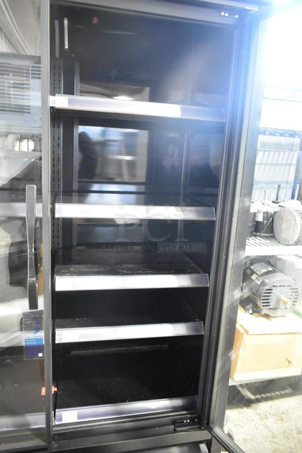 2021 True TVM-48SL-HC commercial 2-door cooler with metal shelves, 115V, 1 phase, open door view.