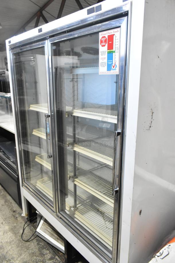 Zero Zone 2 Door Metal Reach-In Cooler Merchandiser, Model 0101-O-R-NT-CF-L-NL-U-C, with poly-coated racks.