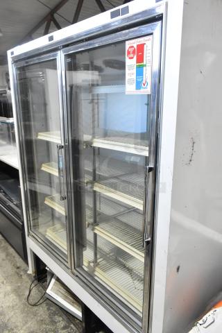 Zero Zone 2 Door Metal Reach-In Cooler Merchandiser, Model 0101-O-R-NT-CF-L-NL-U-C, with poly-coated racks.