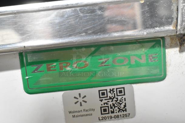 Zero Zone 0101-O-R-NT-CF-L-NL-U-C cooler tag with green logo. Includes Walmart Facility Maintenance QR code and label L2019-081257.