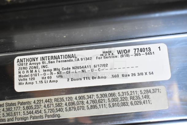 Label on a Zero Zone 0101-O-R-NT-CF-L-NL-U-C commercial cooler, showing model details, voltage, and manufacturing info.