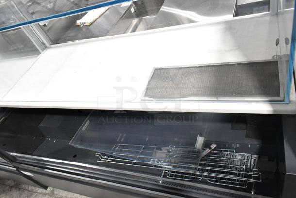 Structural Concepts SBZ6652DR metal commercial open grab-n-go merchandiser, features glass top display, 220V, 1 Phase, used condition.