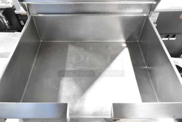 Cleveland stainless steel commercial braising pan; gas powered, manual tilt, floor style, excellent condition.