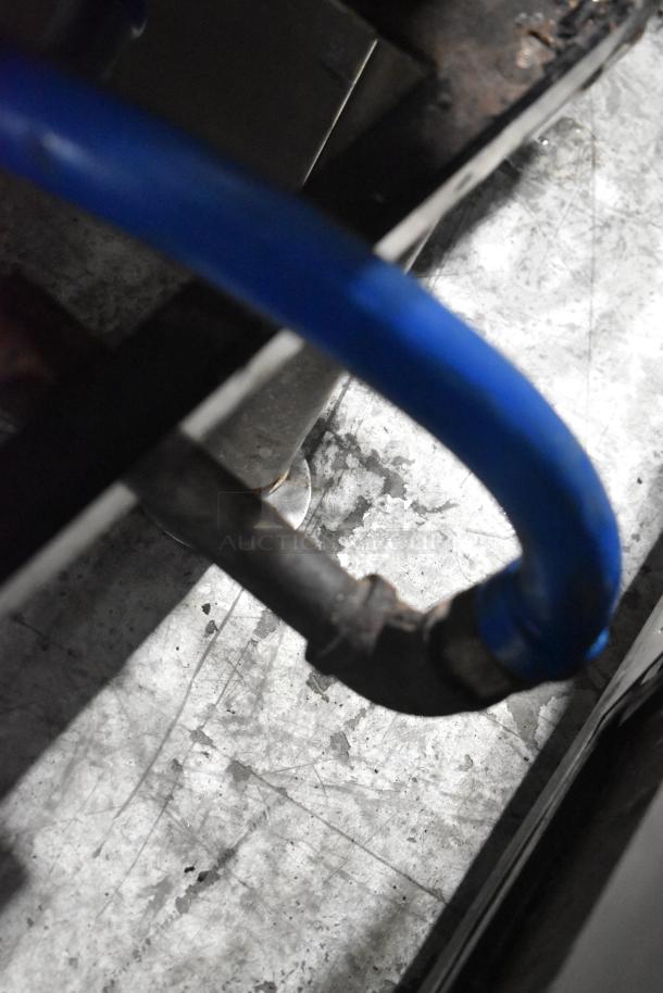 Cleveland stainless steel manual tilt braising pan, gas-powered, showing piping connection.