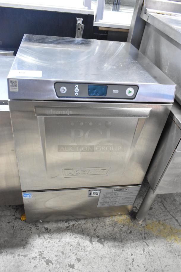 Hobart LXe stainless steel commercial undercounter dishwasher, features control panel, visible brand markings, good condition.