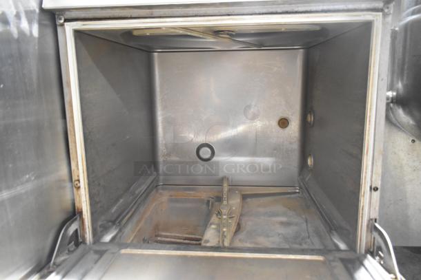 Hobart LXEH stainless steel commercial undercounter dishwasher interior, showing used condition. 120/208-240 Volts, 1 Phase.