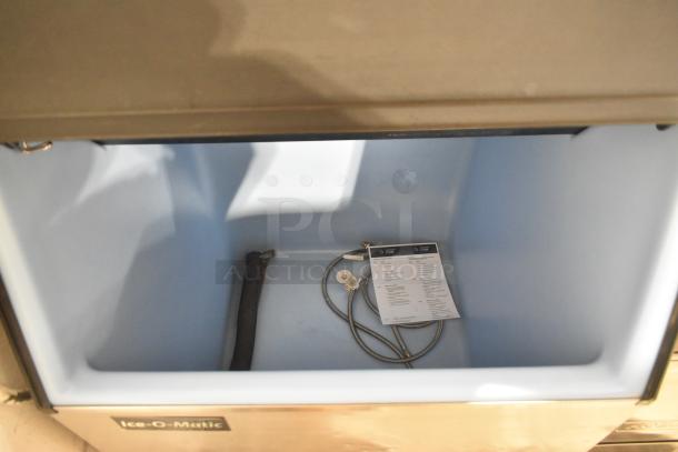 2024 Follett HMC1410WBT stainless steel ice machine head on Ice-O-Matic bin. 1475 lb/day capacity. 208-230V, 1 phase.