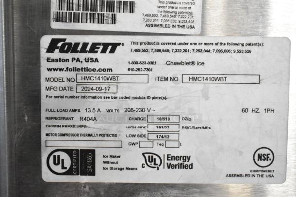 2024 Follett HMC1410WBT stainless steel ice machine head on Ice-O-Matic bin, 1475 lb/day. Label shows model and specs.