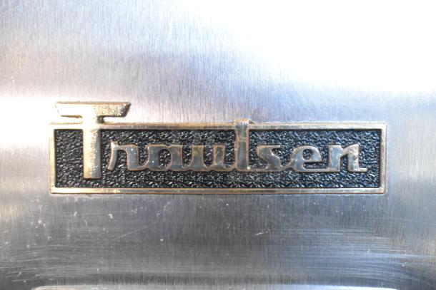 Traulsen TBC13 logo plate on stainless steel surface, highlighting brand detail of a 2019 commercial blast chiller.