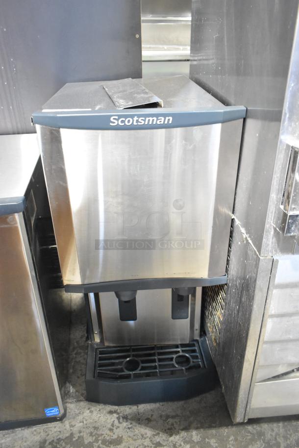 2018 Scotsman HID312A-1A stainless steel countertop ice machine and water dispenser, 12 lb bin, good condition.