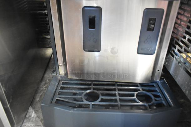 2018 Scotsman HID312A-1A stainless steel ice machine and water dispenser, 12 lb. bin, countertop model, in used condition.
