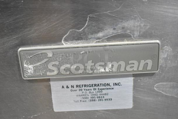 Scotsman CME806AS-32F stainless steel commercial ice machine head, visible label by A & N Refrigeration, 208/230V, 1 phase.