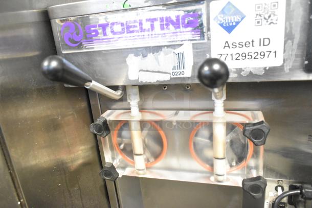 Stoelting SF121-38I2 stainless steel soft serve machine, 2 flavors with twist, drink mixing attachment, 208-240V, visible asset ID.
