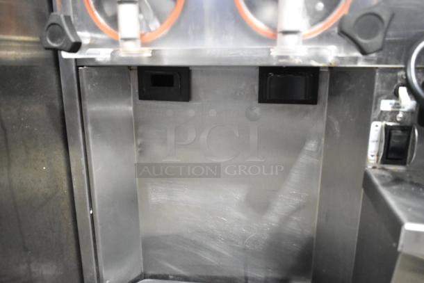 Stoelting SF121-38I2 stainless steel 2-flavor soft serve machine with twist feature, commercial use, drink mixing attachment.