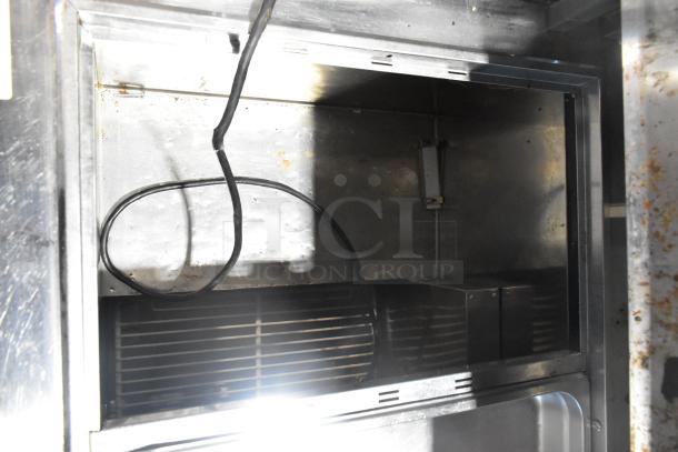 Turbo Air JBT-72 stainless steel refrigerated buffet table interior, showing cooling components, used condition.