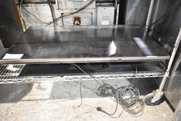 Two Samsung PH43F-P 43" TVs, used condition, 100-240V, 1 phase, cords included, on shelving, pickup required.