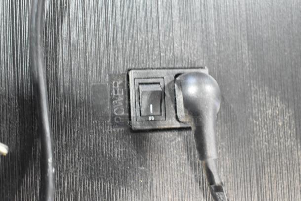 Power switch on the back of a Samsung PH43F-P 43" TV, showing labeled "Power" and "I" marking.