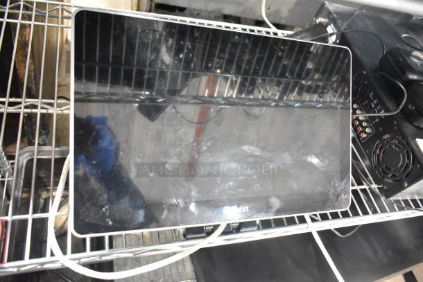 9 various items on metal shelving, featuring a Toast POS monitor with visible wear. Includes 3 Epson receipt printers, 2 Toast credit card scanners, a metal cash drawer, and an Episode ECA-70MIXAMP-1-60 amplifier.