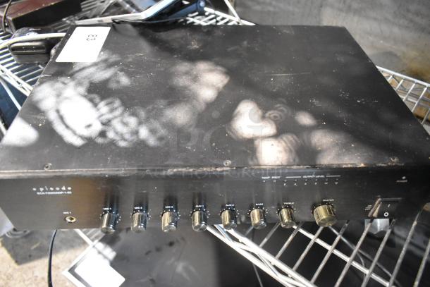 Episode ECA-70MIXAMP-1-60 audio mixer on metal shelf. Shows wear with visible knobs and control panel.