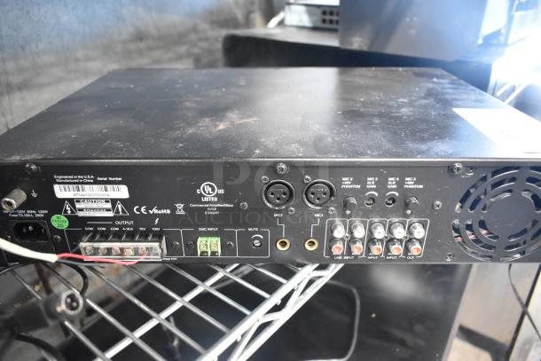 Rear view of Episode ECA-70MIXAMP-1-60 amplifier, displaying input/output ports, ventilation fan, and compliance labels.