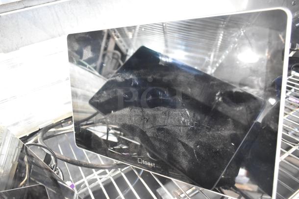 8 assorted items including Toast POS monitors, Elo POS monitor, Samsung S22D300HY monitor; condition varies.