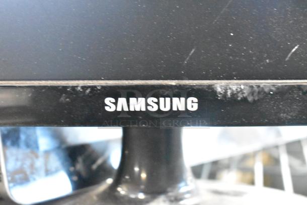 Samsung S22D300HY monitor, black, logo visible on frame. Condition shows surface marks. Part of an 8-item POS auction set.