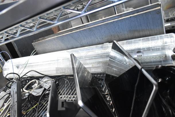 Assorted electronic monitors including Toast POS, Elo POS, and Samsung S22D300HY, mixed condition, bundled in auction.