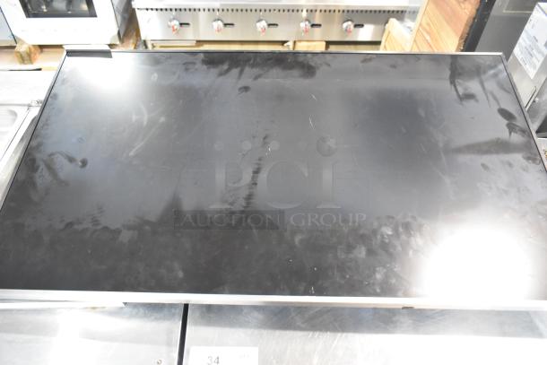 Samsung PH43F-P 43" television, visible smudges on screen, requires pickup, 100-240 Volts, 1 Phase.