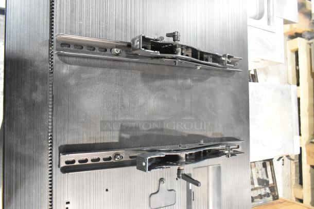 Samsung PH43F-P 43" television, black finish, wall-mounted bracket, 100-240 volts, 1 phase, local pickup only.