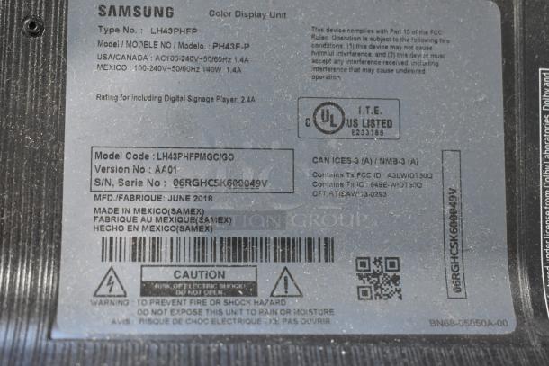 Samsung PH43F-P 43" television label showing model and serial numbers, voltage specifications, and manufacturing details.