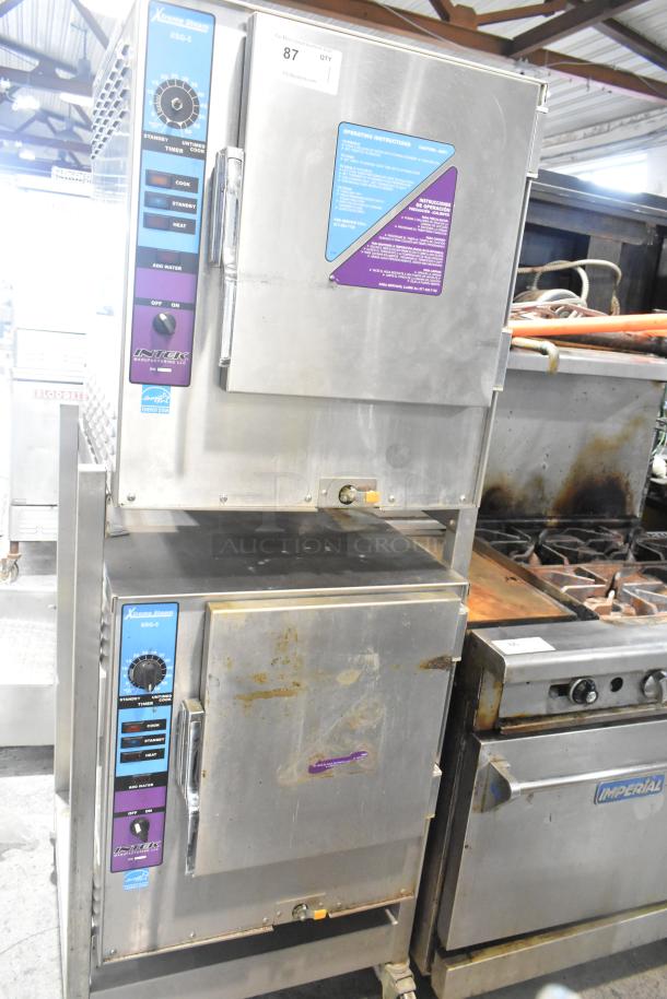 Intek Xtreme Steam XSG-5 stainless steel steam cabinet on stand, 65,000 BTU. Features control panel, visible wear.