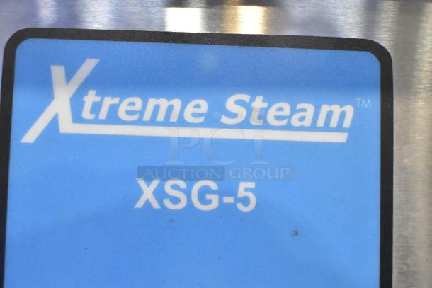 Intek Xtreme Steam XSG-5 label on stainless steel commercial steam cabinet, 65,000 BTU, natural gas powered.