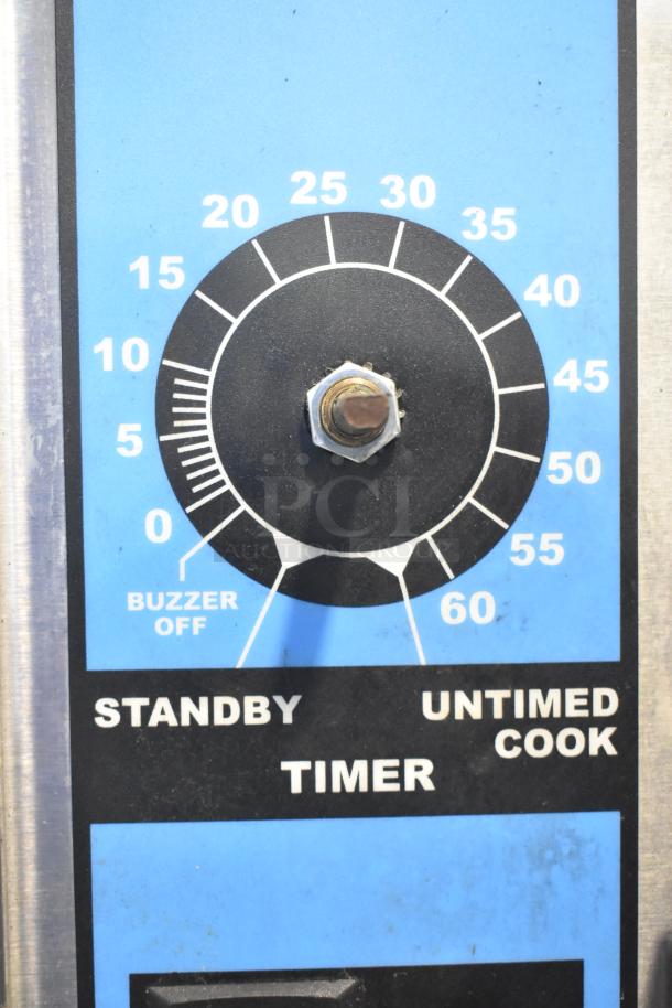 Timer dial of Intek Xtreme Steam XSG-5 steam cabinet, showing settings for standby, untimed cook, and buzzer off.