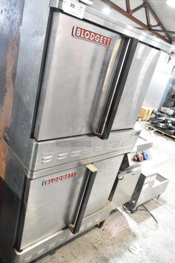 Blodgett stainless steel commercial gas convection oven with solid doors, metal racks, and thermostatic controls.