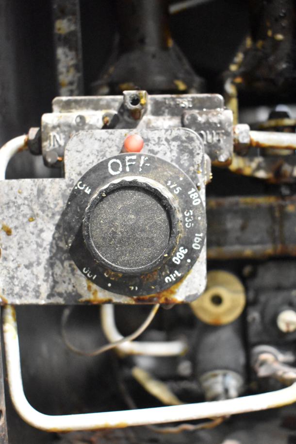 Pitco Frialator 14S deep fat fryer control dial, showing temperature settings and worn condition.