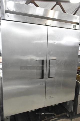 True TS-49 stainless steel 2-door commercial reach-in cooler with poly-coated racks. Model TS-49, 115 volts, 1 phase.
