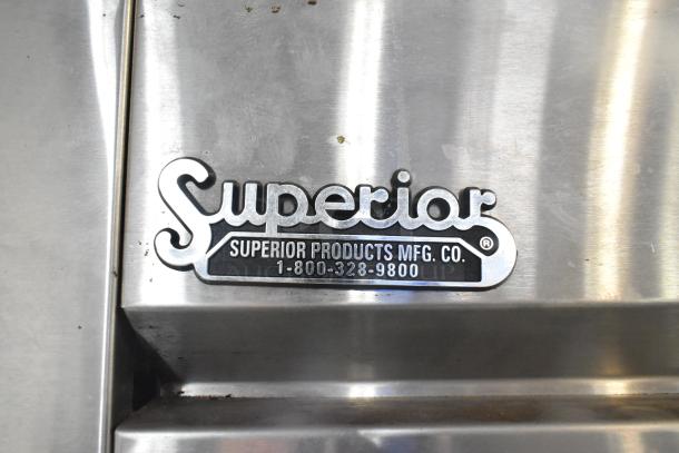 True TS-49 stainless steel commercial cooler, 2-door, includes poly-coated racks, 115 volts, 1 phase. Superior label visible.