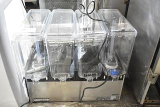 BRAND NEW SCRATCH AND DENT! Vollrath VBBE4-37-F Stainless Steel Commercial Quadruple 5.28 Gallon Bowl Refrigerated Beverage Dispenser with Fountain Spray Circulation. 115 Volts, 1 Phase. - Item #1225749