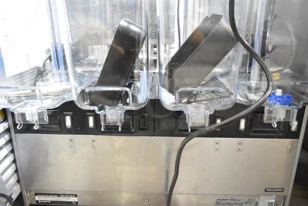 Brand new Vollrath VBBE4-37-F stainless steel refrigerated beverage dispenser, quadruple 5.28-gallon bowls, fountain spray.