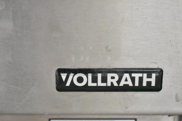 Vollrath VBBE4-37-F stainless steel commercial beverage dispenser label on scratch and dent unit.