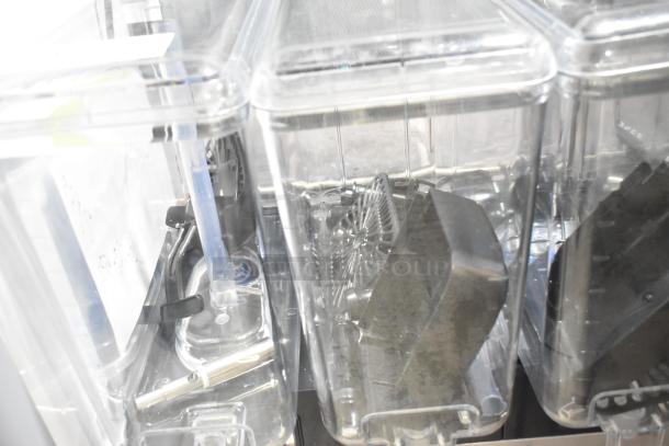 BRAND NEW VOLLRATH VBBE4-37-F beverage dispenser, 4 clear bowls, 5.28 gal each, stainless steel, 115V, fountain spray circulation.