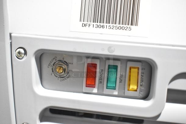 Brand new Avantco 360DFF13HCL display freezer control panel with temperature and power switches, barcode label visible.