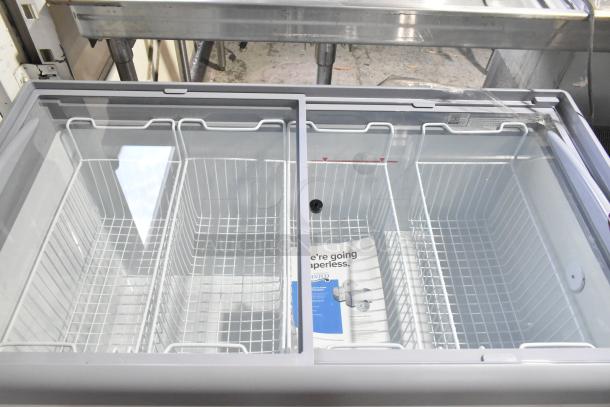 Brand new Avantco 360DFF13HCL ice cream freezer merchandiser, metal flat-top, customizable, 115V, 1-phase, visible interior baskets.
