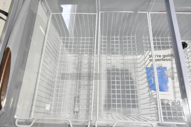 Brand new Avantco 360DFF13HCL flat top ice cream freezer, metal, 115V, customizable, scratch and dent, interior view.