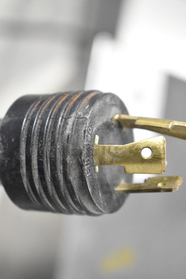 Close-up of a power plug for a Valmar EASY 3 TTi AIR commercial batch freezer. Plug shows minor wear.