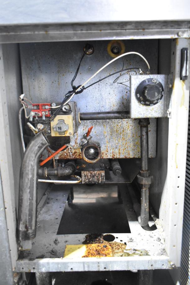 Frymaster GF40SD stainless steel commercial deep fat fryer, natural gas, 122,000 BTU, interior with visible rust.