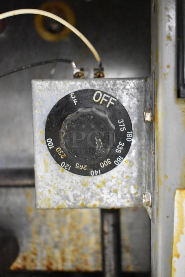 Control panel of Frymaster GF40SD commercial deep fryer, showing temperature dial with visible wear.